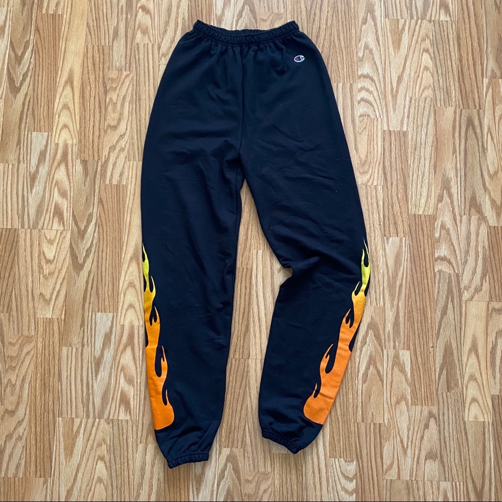 KYLIE JENNER/CHAMPION NAVY BLUE FLAMES SWEATPANTS